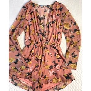Pink long sleeve floral romper